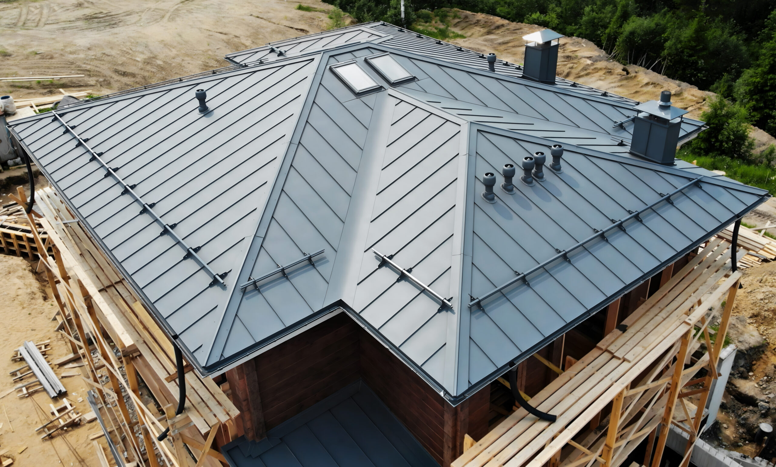 Aerial view of house retro roof panel with standing seam, fastener.