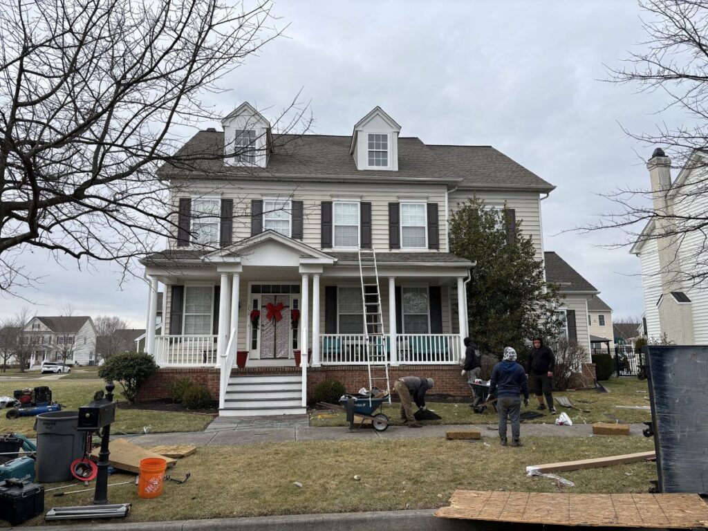 designer shingles CTA Exteriors project workers installing roof