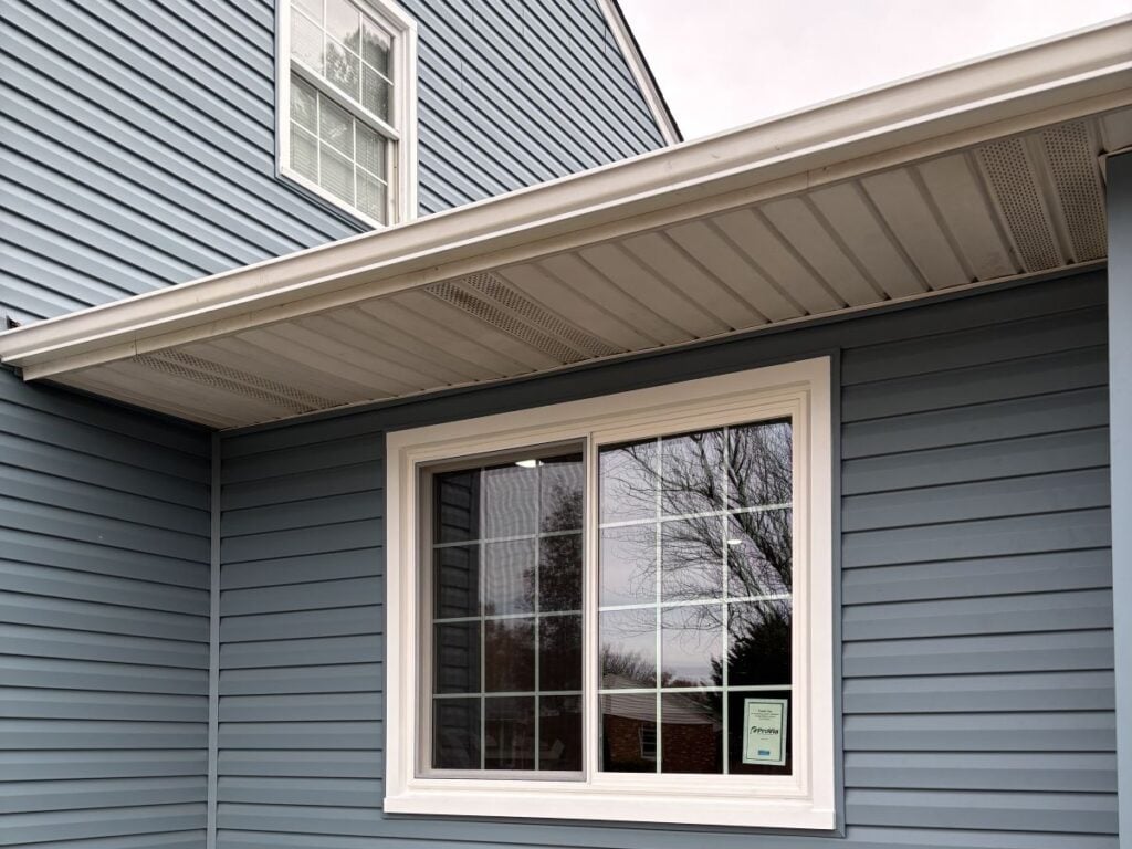 retrofit windows CTA Exteriors project blue sidings