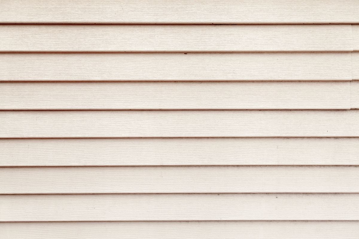White siding on old house