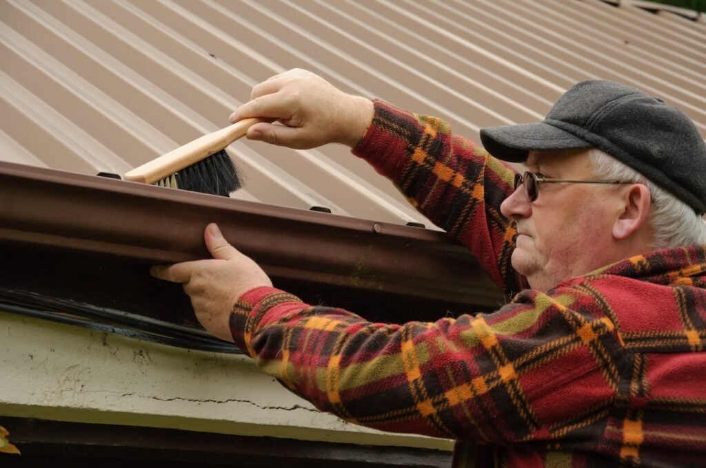 keep gutters clean on metal roof