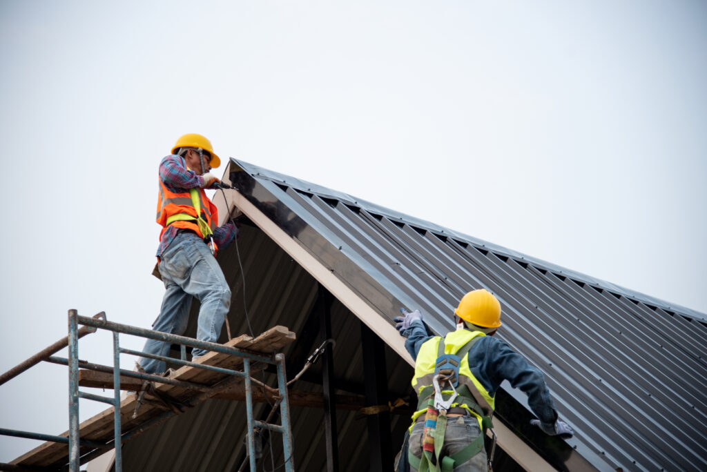 newark de commercial roofing Technician is Work Roof Repair Construction engineer wear safety uniform inspection metal roofing work for roof